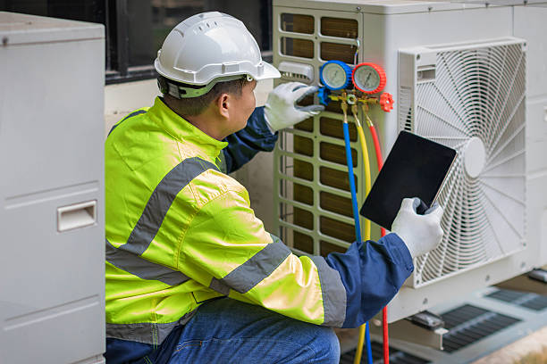 Professional Air Duct Cleaning technician working in New Carlisle, OH